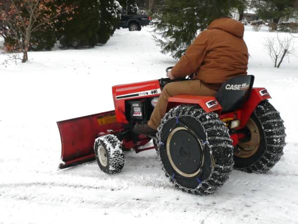 1) Case 446 Tractor SnowPlowing