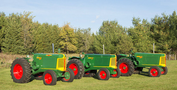 3 Oliver Tractors In Row